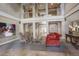 Grand lobby space featuring high ceilings, a seating area and natural light at 300 Hudson St # 202, Denver, CO 80220