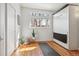 Stylish bedroom with hardwood floors, a murphy bed, and bright natural light at 1486 S Elm St, Denver, CO 80222