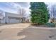 View of the property with a driveway and well-manicured front yard landscaping at 1834 Hennington Ct, Longmont, CO 80501