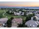 Scenic aerial view of the home in a lush community with mountain views at 10085 Charissglen Ct, Highlands Ranch, CO 80126