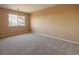 Bedroom with carpet flooring and a bright window at 10085 Charissglen Ct, Highlands Ranch, CO 80126