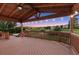 Evening view from the covered deck with outdoor lighting, offering a cozy outdoor living space at 10085 Charissglen Ct, Highlands Ranch, CO 80126