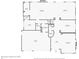 First floor plan featuring a living room, kitchen, wet bar, office, dining room, and garage at 10085 Charissglen Ct, Highlands Ranch, CO 80126