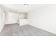 Bonus room features neutral carpet, white walls, and a ceiling light fixture at 13382 E 110Th Way, Commerce City, CO 80022