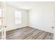 Office space with wood-look floors, white walls, and lots of natural light at 13382 E 110Th Way, Commerce City, CO 80022