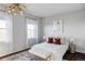 Charming bedroom with a queen bed and stylish decor at 6003 Chester Way, Denver, CO 80238