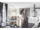 Open concept dining room with a large table and adjacent kitchen at 6003 Chester Way, Denver, CO 80238