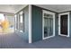 Front porch with double doors and sidelights leading into the home at 6003 Chester Way, Denver, CO 80238