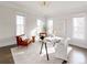 Home office with hardwood floors, a large desk, and ample natural light at 6003 Chester Way, Denver, CO 80238