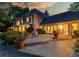 Cozy backyard patio featuring a fire pit, comfortable seating, and lush plantings, perfect for relaxing evenings at 1512 Cottonwood Ln, Greenwood Village, CO 80121