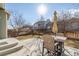 Backyard features a fenced yard and patio with outdoor seating at 12133 Hannibal St, Commerce City, CO 80603
