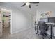 Neutral bedroom with a walk-in closet and a work desk at 12133 Hannibal St, Commerce City, CO 80603