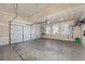 Spacious two car garage with windows and storage at 12133 Hannibal St, Commerce City, CO 80603