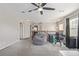 Upstairs loft area with carpet, ceiling fan, and study area at 12133 Hannibal St, Commerce City, CO 80603