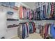 Walk-in closet with ample storage, shelving, and hanging racks for clothing and accessories at 12133 Hannibal St, Commerce City, CO 80603