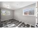 Bright dining area with stylish tile flooring, large windows, and natural light at 1560 Pueblo Ct, Thornton, CO 80229