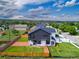 Expansive aerial view of the modern home showcasing its architectural design, landscaping, and neighborhood setting at 3343 S Newcombe St, Lakewood, CO 80227