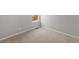 Bright, neutral bedroom with plush carpeting, ready for personalization and comfortable living at 2165 Alyssa St, Fort Lupton, CO 80621