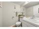 Well-lit bathroom with white fixtures, clean lines, and functional design at 6988 S Knolls Way, Centennial, CO 80122