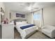 Comfortable bedroom featuring a ceiling fan, soft lighting, and a calming atmosphere at 6988 S Knolls Way, Centennial, CO 80122