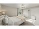 Comfortable bedroom with abundant natural light, plush carpet, and ample closet space at 6988 S Knolls Way, Centennial, CO 80122