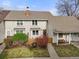 Charming two-story home with well-maintained lawn and welcoming front porch at 6988 S Knolls Way, Centennial, CO 80122