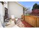 Inviting front porch featuring charming furniture and a welcoming ambiance at 6988 S Knolls Way, Centennial, CO 80122