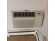 Image of an air conditioning unit mounted on the wall, above a heater at 755 S Clinton St # 1B, Denver, CO 80247