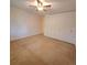 Bedroom with neutral carpet and a large wardrobe, offering ample storage and adaptable space at 755 S Clinton St # 1B, Denver, CO 80247