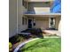 Charming entrance with well-kept landscaping and clear building address at 755 S Clinton St at 755 S Clinton St # 1B, Denver, CO 80247