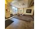 Comfortable lobby area with stylish seating, ample natural light, and tiled flooring at 755 S Clinton St # 1B, Denver, CO 80247