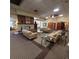 Inviting lobby area with comfortable seating, stone fireplace, and decorative accents at 755 S Clinton St # 1B, Denver, CO 80247