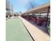This outdoor dining area features covered seating and ample space for community gatherings and leisure at 755 S Clinton St # 1B, Denver, CO 80247