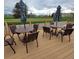 Outdoor patio area featuring comfortable seating and scenic golf course views at 755 S Clinton St # 1B, Denver, CO 80247