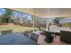 Inviting backyard patio with dining table, lounge furniture, and lush green lawn at 10385 E Ida Ave, Greenwood Village, CO 80111