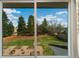 View from a window highlighting the expansive backyard and privacy fence at 10385 E Ida Ave, Greenwood Village, CO 80111
