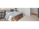 Comfortable bedroom with a wooden bed frame, soft carpet, and neutral decor at 10385 E Ida Ave, Greenwood Village, CO 80111