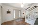 Inviting entryway featuring hardwood floors, a staircase, and decorative accents at 10385 E Ida Ave, Greenwood Village, CO 80111