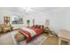 Cozy bedroom with natural lighting, a ceiling fan, and rustic decor and furnishings at 13504 Pecos St, Westminster, CO 80234