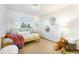 Bright bedroom with a daybed, a large window, and a cozy feel at 13504 Pecos St, Westminster, CO 80234
