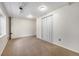 This is a bedroom featuring neutral carpeting, a closet, and ample lighting for a welcoming atmosphere at 13504 Pecos St, Westminster, CO 80234