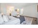 Bright bedroom featuring neutral decor, and doorway to bathroom at 19 Benthaven Pl, Boulder, CO 80305