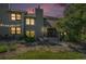 Well-maintained townhome exterior with manicured lawn, front patio, and classic architecture at 19 Benthaven Pl, Boulder, CO 80305