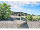 Charming townhouse with mountain views, mature trees, and a classic roofline at 19 Benthaven Pl, Boulder, CO 80305