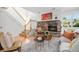 Comfortable living room featuring a stone fireplace, staircase, and stylish furnishings for a cozy ambiance at 19 Benthaven Pl, Boulder, CO 80305