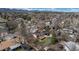 Scenic aerial view of a home highlighting its backyard, patio, and surrounding neighborhood at 8170 S Marshall Ct, Littleton, CO 80128