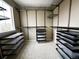 Spacious walk-in closet with custom shelving and storage solutions at 9377 Longstone Dr, Parker, CO 80134