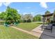 Beautiful backyard offering a fire pit and plenty of room for outdoor seating and relaxing in the sunshine at 8333 Depew Way, Arvada, CO 80003