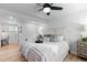 Inviting bedroom with soft textures, a ceiling fan, and a dedicated workspace at 8333 Depew Way, Arvada, CO 80003