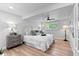 Comfortable bedroom showcases a plush bed, modern ceiling fan, and ample natural light at 8333 Depew Way, Arvada, CO 80003